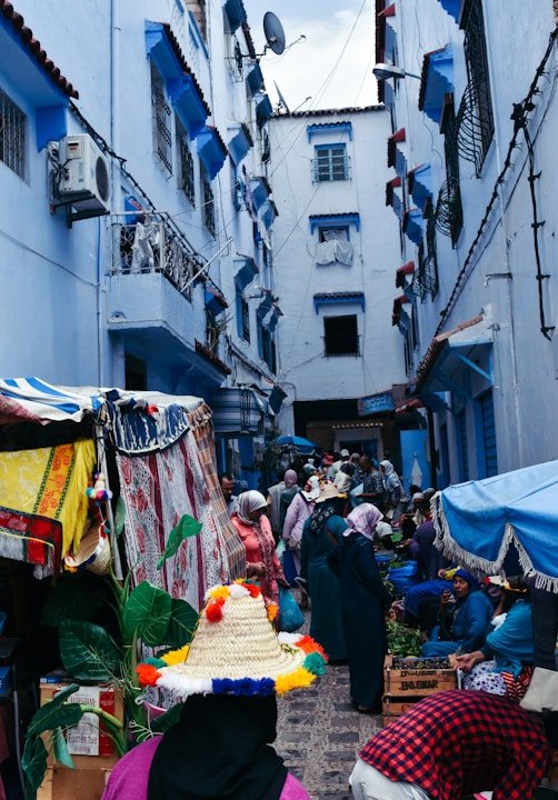 person buying good on street